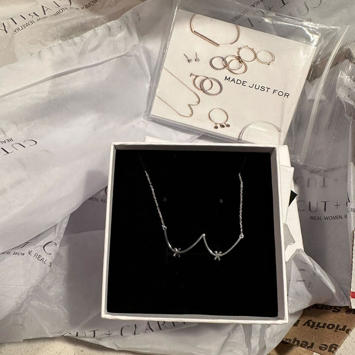 boob necklace