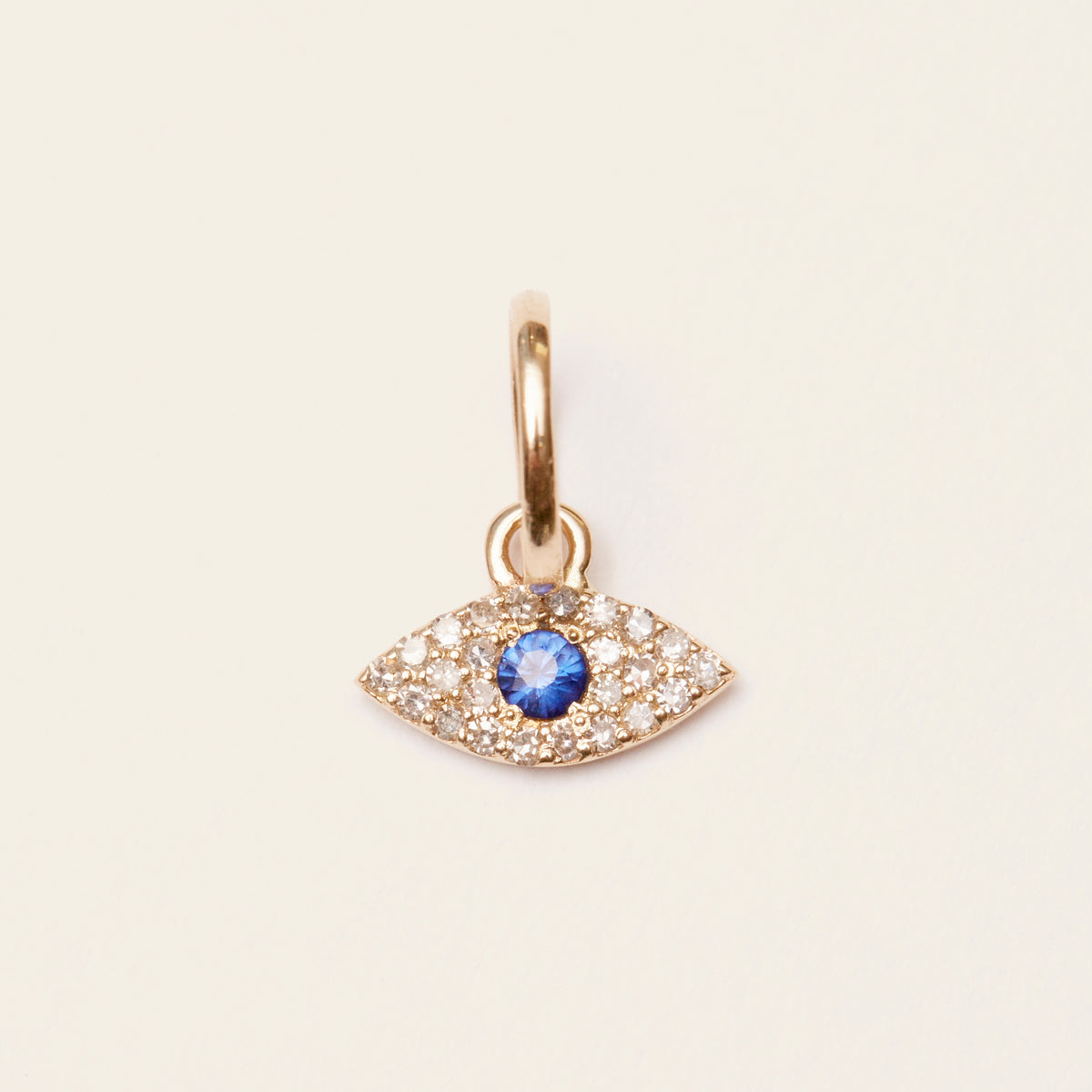 gold evil eye charm